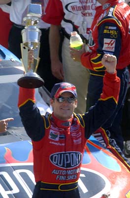 Jeff Gordon holds up Brickyard 400 trophy