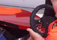 Handing IRL steering wheel to driver